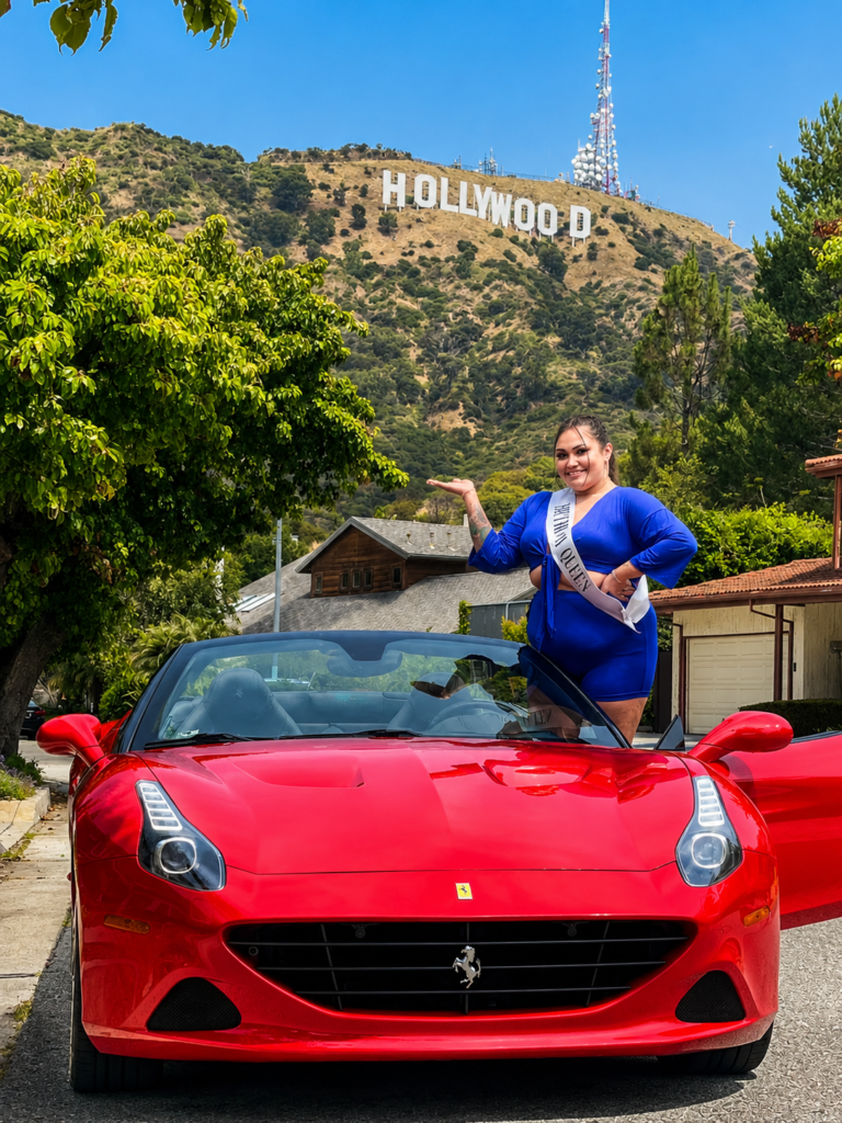 Woman celebrating her birthday with a red Ferrari near the Hollywood Sign during a VIP exotic car experience in Los Angeles.