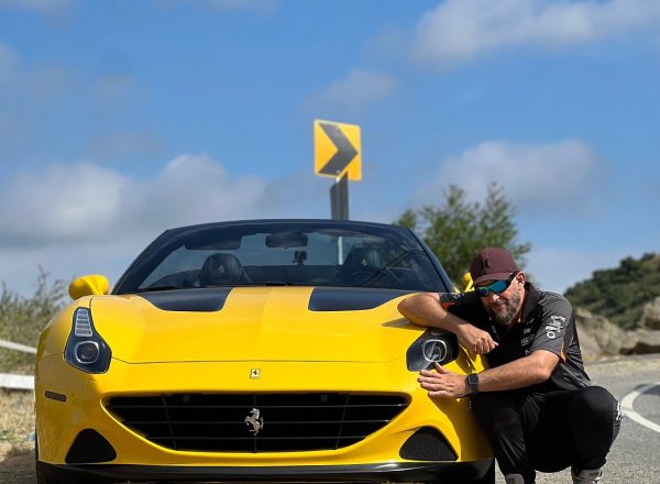 man yellow ferrari hollywood sign los angeles driving experience ride like a star
