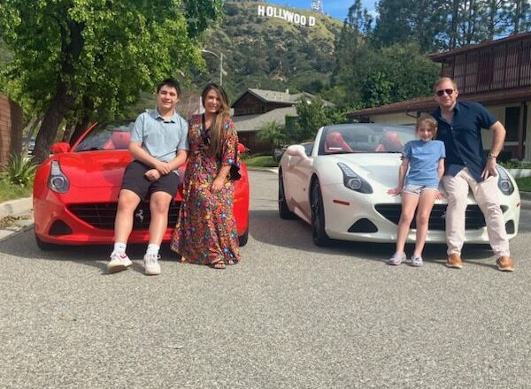 families posing ferrari convertibles hollywood sign things to do los angeles