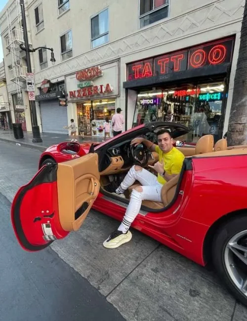 man red ferrari california t hollywood walk of fame los angeles