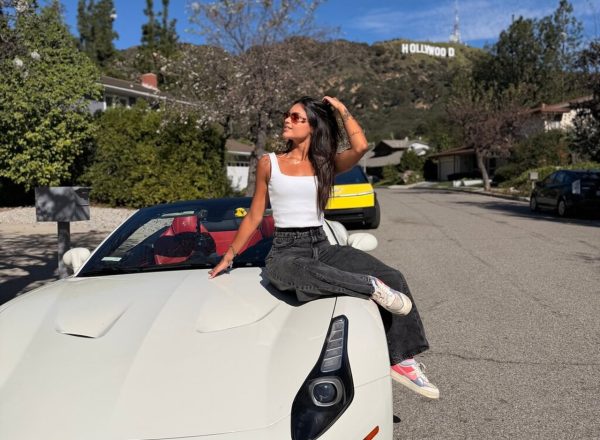 woman posing white ferrari hollywood sign things to do los angeles
